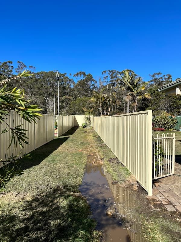 Kew Colorbond fence install — Mid Coast Boundary Fencing, NSW