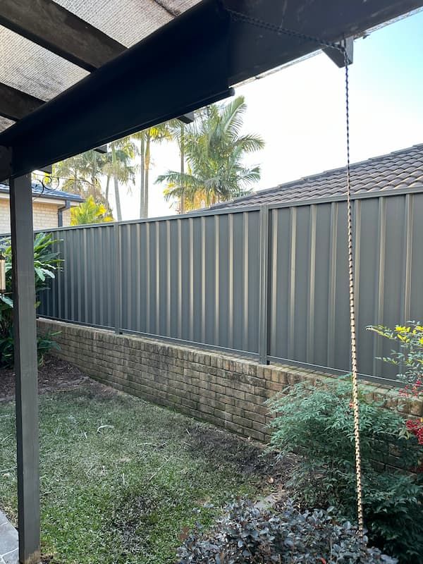 Forster Colorbond boundary fence install — Mid Coast Boundary Fencing, NSW
